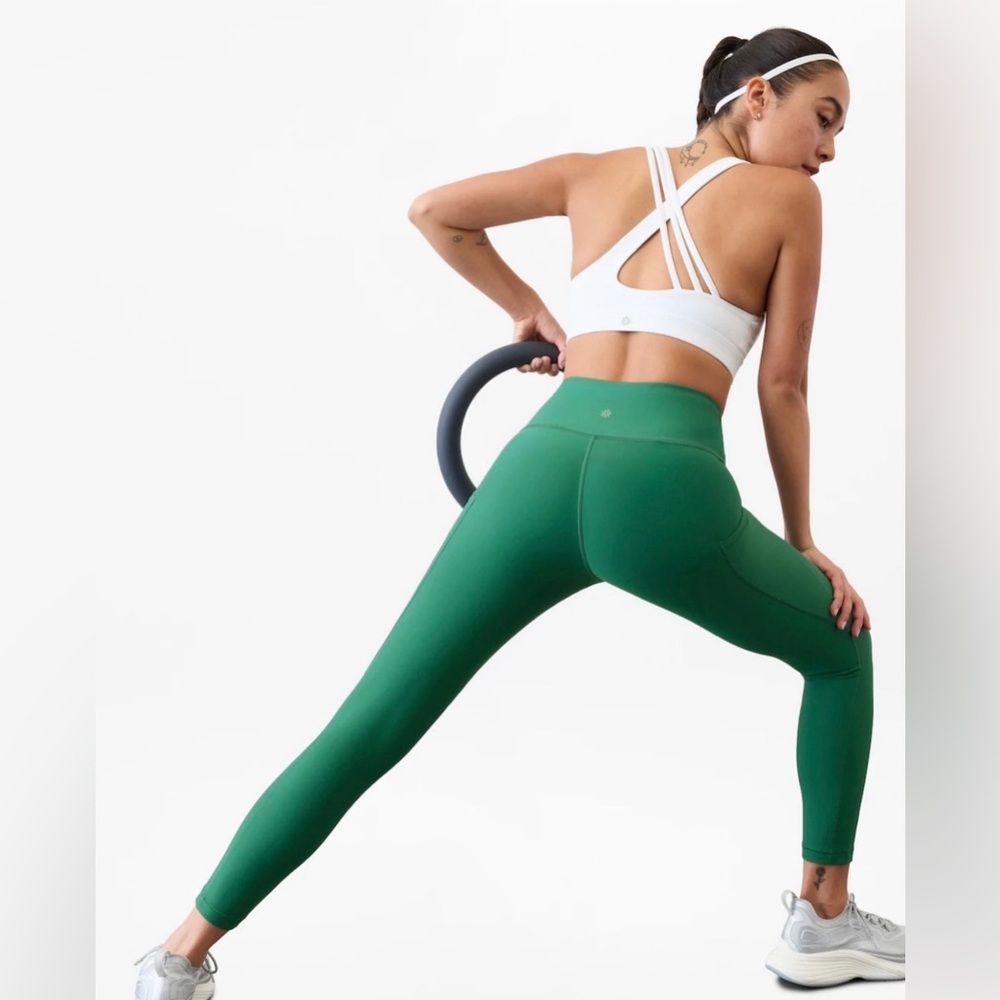 Athleta Interval Stash High Rise 7/8 Leggings in Green Size XS